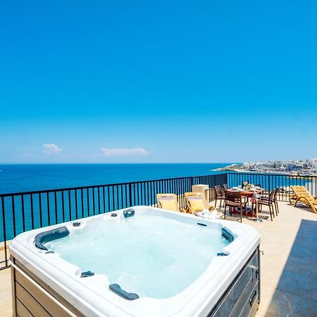 Islet Promenade Seafront Penthouse With Breathtaking Seaviews And Private Hot Tub On The Large Terrace By Getawaysmalta Apartment St. Paul's Bay Bagian luar foto