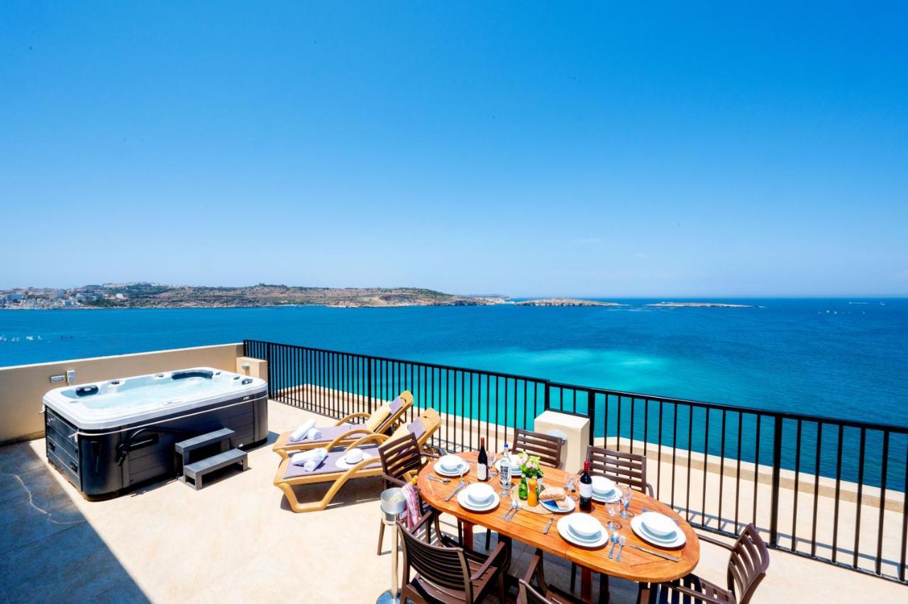 Islet Promenade Seafront Penthouse With Breathtaking Seaviews And Private Hot Tub On The Large Terrace By Getawaysmalta Apartment St. Paul's Bay Bagian luar foto