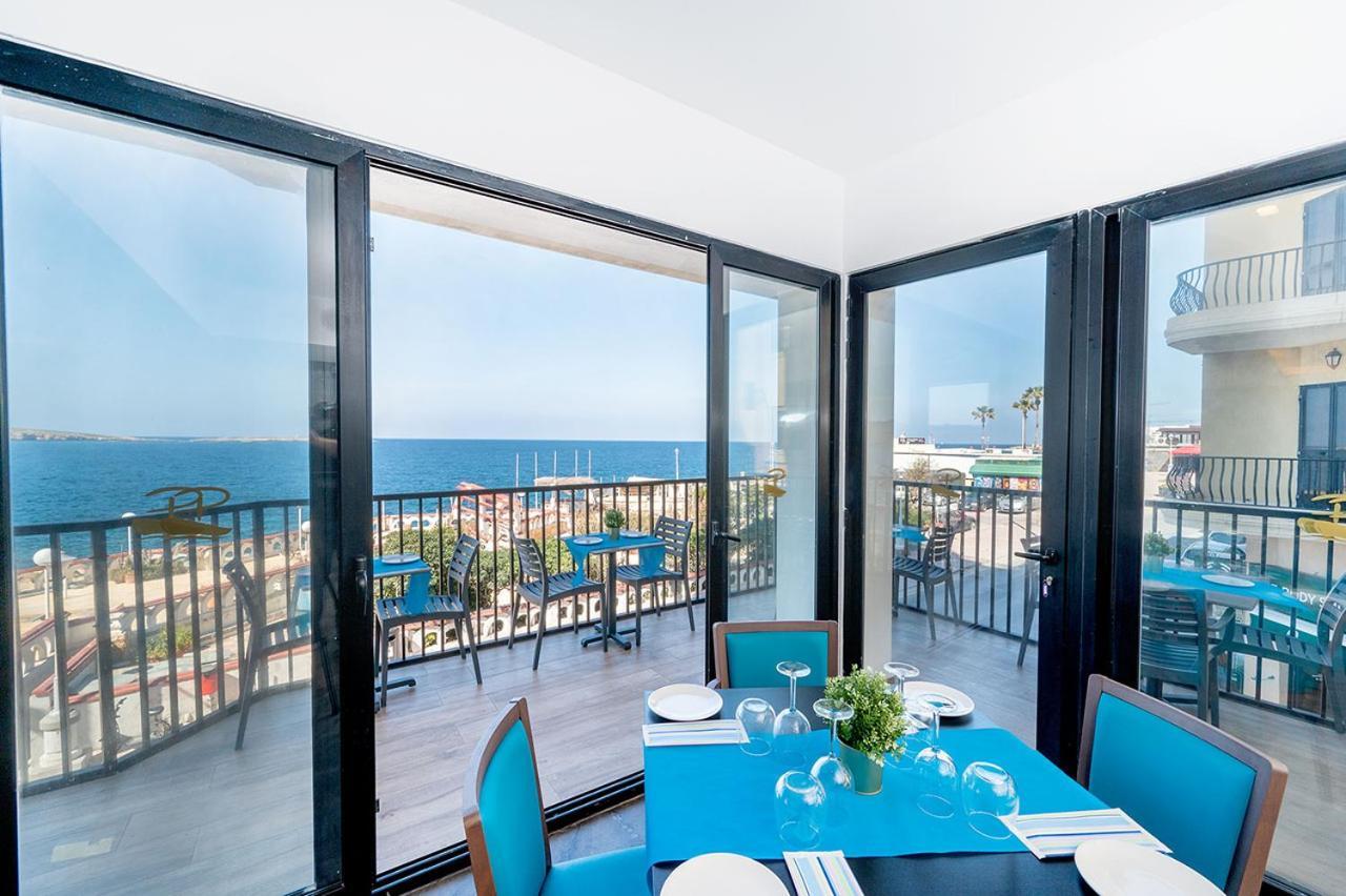 Islet Promenade Seafront Penthouse With Breathtaking Seaviews And Private Hot Tub On The Large Terrace By Getawaysmalta Apartment St. Paul's Bay Bagian luar foto